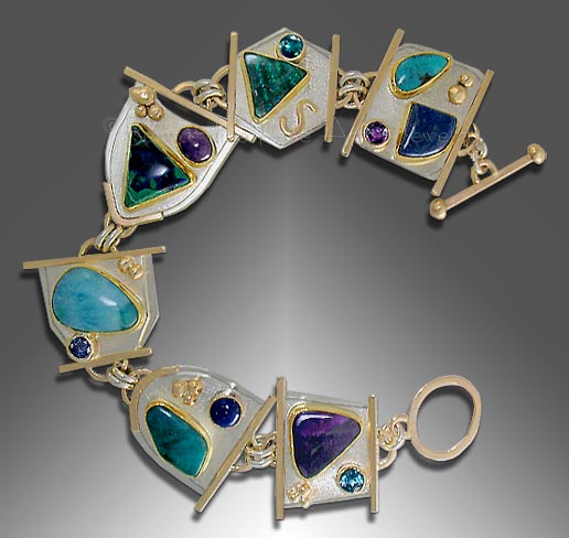 silver, gold gemstone bracelet